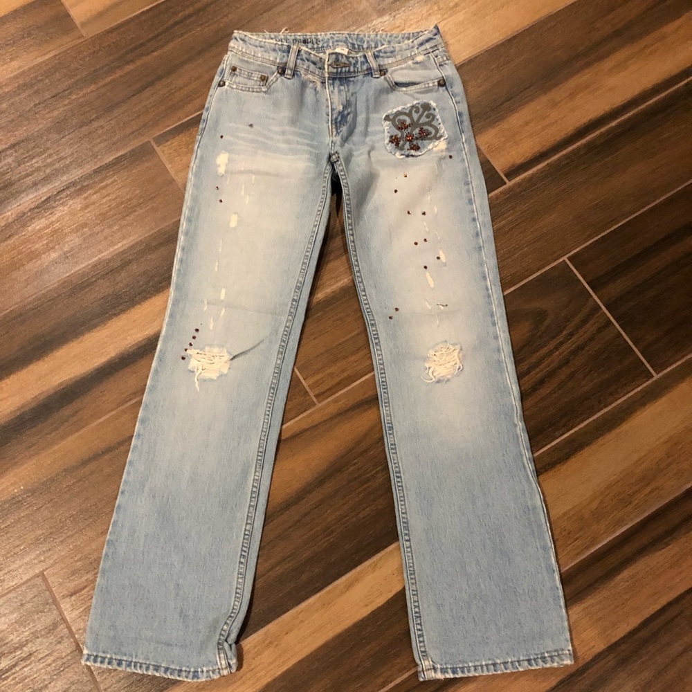 Distressed and embellished jeans